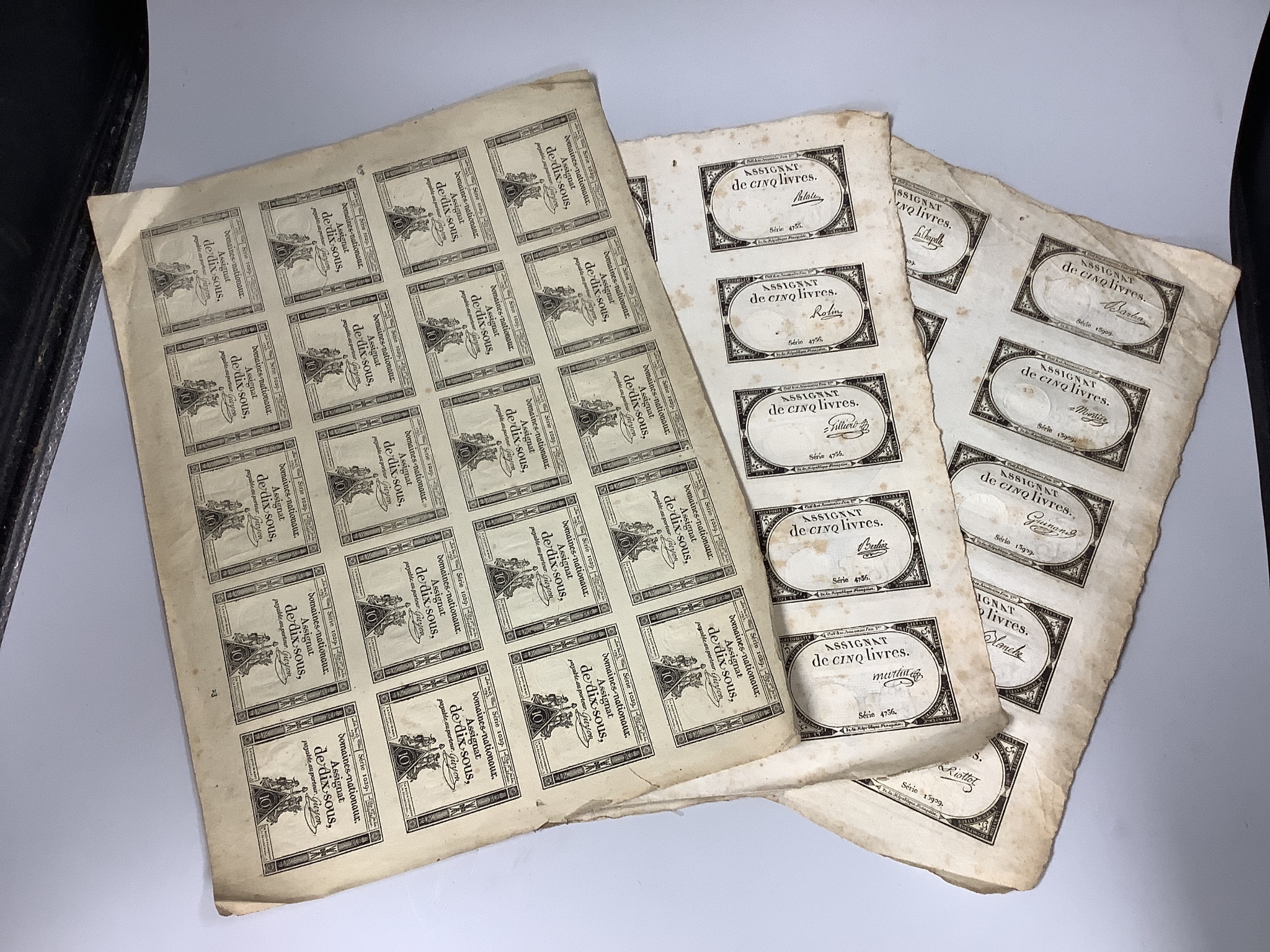 French Revolutionary banknotes, Republic Francaise, an uncut sheet of 20 domaines nationaux Assignat de dix francs, 10 francs, Loi du 23 Mai 1793, Serie 1029, and 2 sheets of 10 Assignat de cinq livres, 5 livres, Serie 4